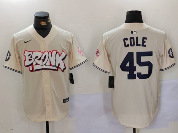 Men's New York Yankees #45 Gerrit ColeCream The Bronx Graffiti V2 Vapor Limited Stitched Baseball Jerseys